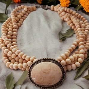 Vintage handcarved beaded necklace with pendant in